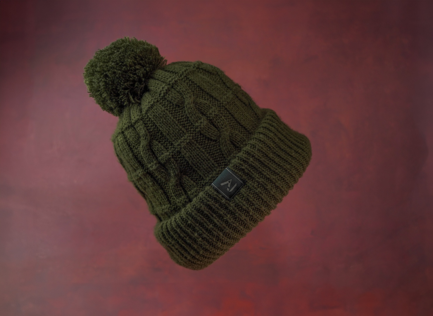 One More Cast Forest Green Cable Knit Bobble