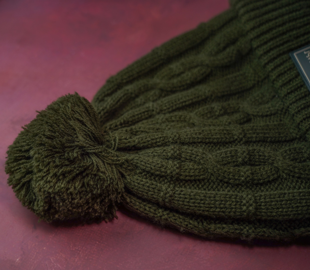 One More Cast Forest Green Cable Knit Bobble